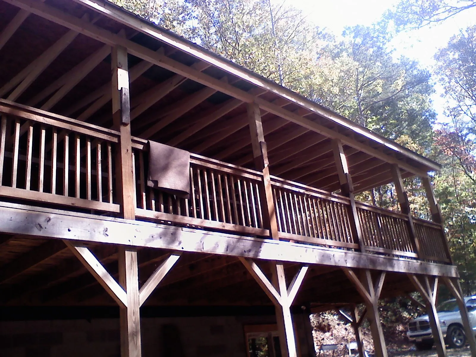 Timber framing under a new elevated porch and deck — Roof Leak Repair in Colon by Roofing Brothers